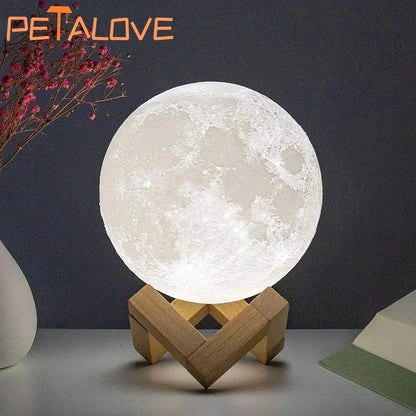 mini 3D moon lamp glowing warm on a small wooden stand beside a bed at night – view 7